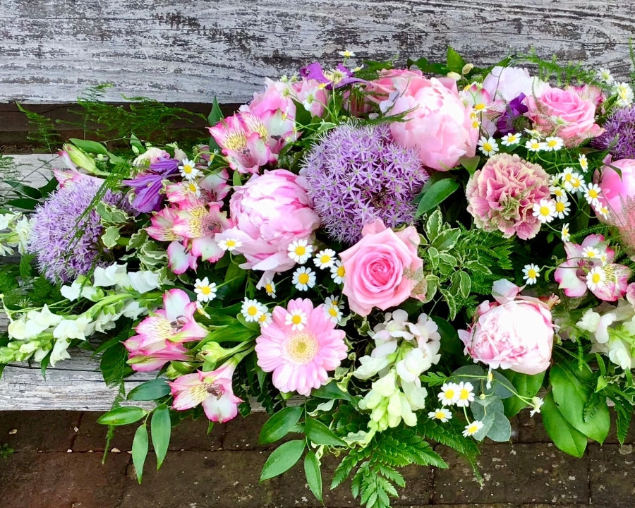 Pink & Lilac Casket Spray fresh flowers made by The Petal Boutique in Winchester